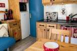 Discover this charming kitchen space, perfect for cozy living.