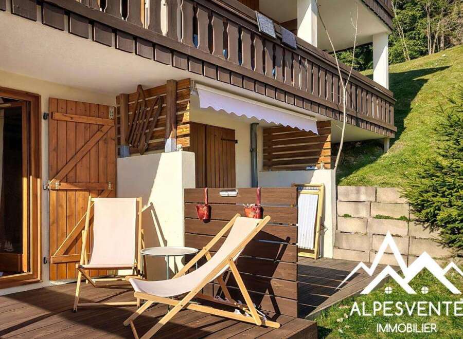 Enjoy the tranquility of this charming property, featuring a cozy outdoor space perfect for relaxation.