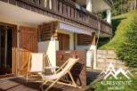Enjoy the tranquility of this charming property, featuring a cozy outdoor space perfect for relaxation.