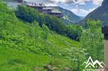 Discover this stunning property nestled in a picturesque mountain landscape, offering breathtaking views of the surrounding valleys and ski slopes.