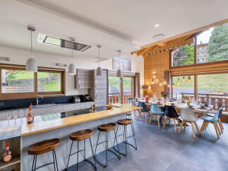 Experience luxury living in this stunning open-plan kitchen and dining area.