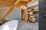Experience luxury in this stunning bathroom featuring a modern design and high-end finishes.