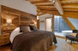 Experience luxury and comfort in this stunning bedroom.