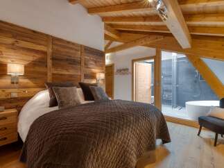 Experience luxury and comfort in this stunning bedroom.