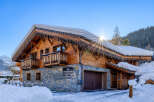 Discover the charm of this stunning chalet nestled in a winter wonderland.