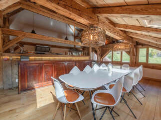 Experience rustic elegance in this stunning property, featuring exposed wooden beams and a warm, inviting atmosphere.