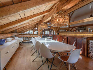 Experience the charm of this stunning property, featuring a beautifully designed dining area.