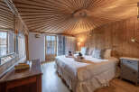 Experience the rustic charm of this beautifully designed bedroom.