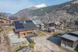 Discover a charming chalet nestled in a picturesque mountain village, offering stunning views and a tranquil atmosphere.