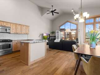 This stunning property boasts a modern kitchen with stainless steel appliances and ample cabinet space, perfect for culinary enthusiasts.