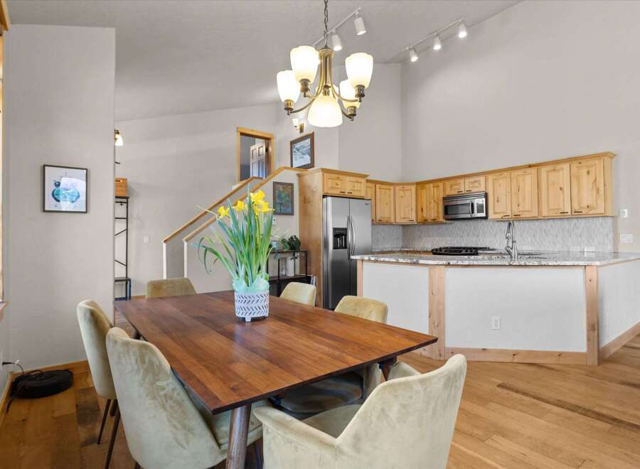 Step into this inviting dining area, perfect for both everyday meals and entertaining.