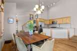 Step into this inviting dining area, perfect for both everyday meals and entertaining.