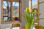 This stunning dining room boasts natural light and elegant design.