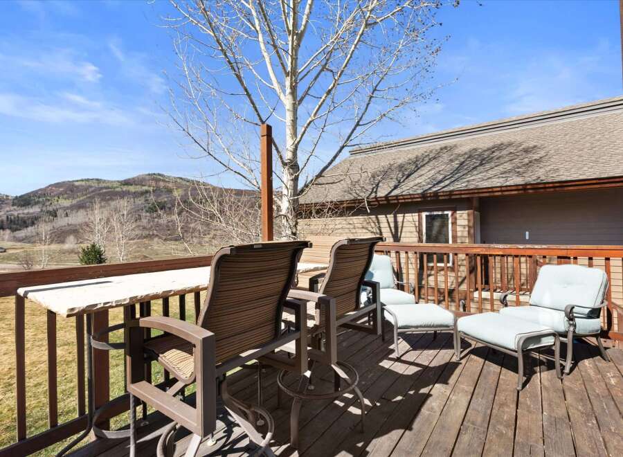 Enjoy breathtaking mountain views from this stunning outdoor deck.