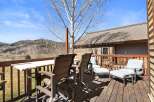 Enjoy breathtaking mountain views from this stunning outdoor deck.