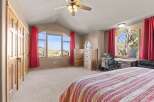 Step into this inviting bedroom, featuring a spacious layout and abundant natural light.