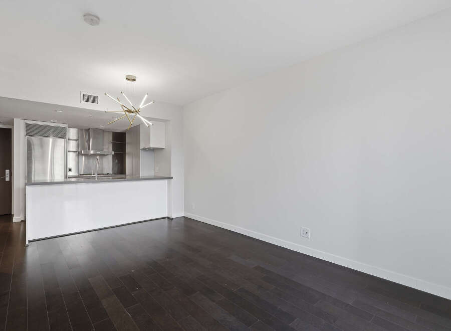 Experience modern living in this stunning property featuring sleek stainless steel appliances and a contemporary design.
