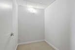 Step into this bright and airy space, perfect for a home office or a cozy reading nook.