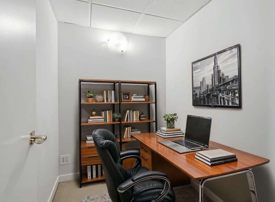 Step into this stylish home office, perfect for productivity and focus.