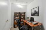 Step into this stylish home office, perfect for productivity and focus.