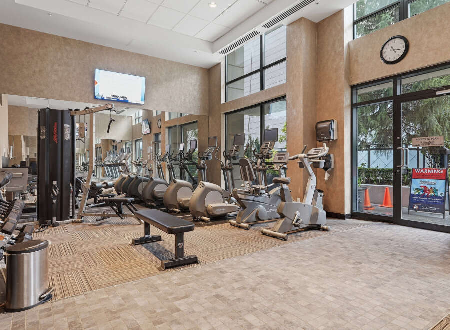 Step into a state-of-the-art fitness center, designed to elevate your workout experience.