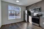 Step into this stunning kitchen, boasting modern appliances and sleek cabinetry.