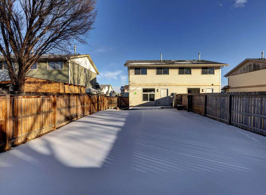 This stunning property boasts a spacious backyard, perfect for outdoor activities and relaxation.