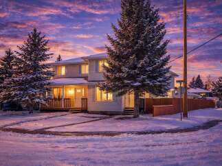 Discover this charming two-story home, ideally situated in a serene neighborhood.