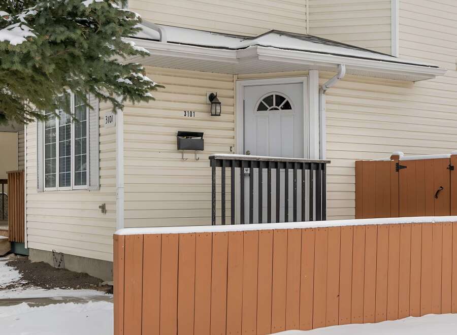 This charming property features a welcoming facade with a well-maintained exterior.
