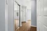Step into this inviting entryway, featuring a modern design with sleek lines and neutral tones.