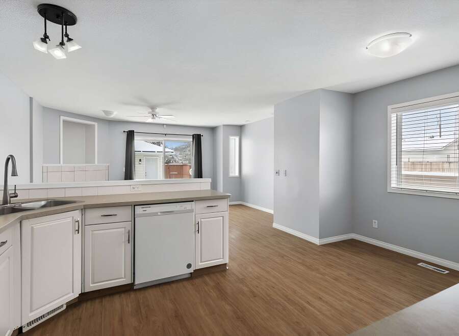 Step into this bright and airy kitchen, perfect for culinary adventures and entertaining.