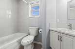 This bathroom features a clean and modern design with a neutral color palette.