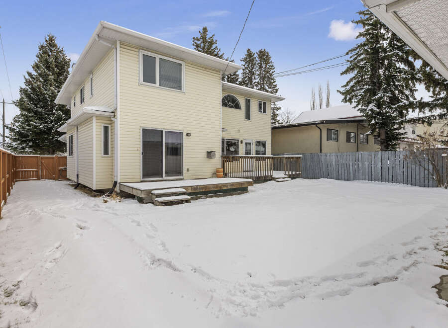 This beautiful two-story home offers a spacious backyard perfect for outdoor activities.