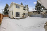 This beautiful two-story home offers a spacious backyard perfect for outdoor activities.