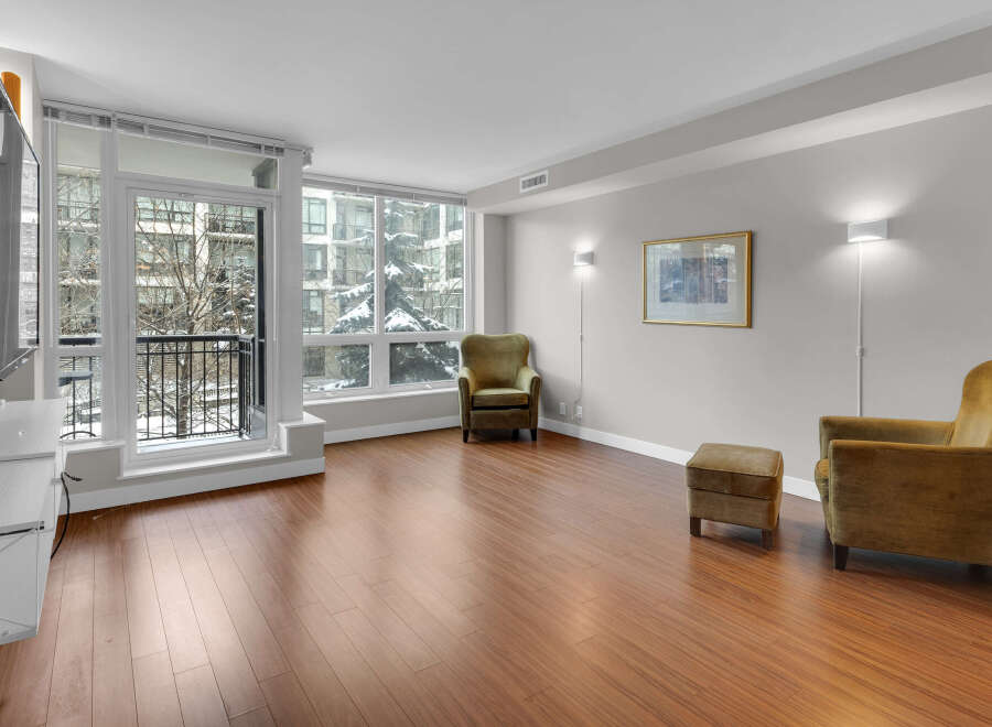 Experience luxury living in this stunning condo featuring a bright and airy living space.