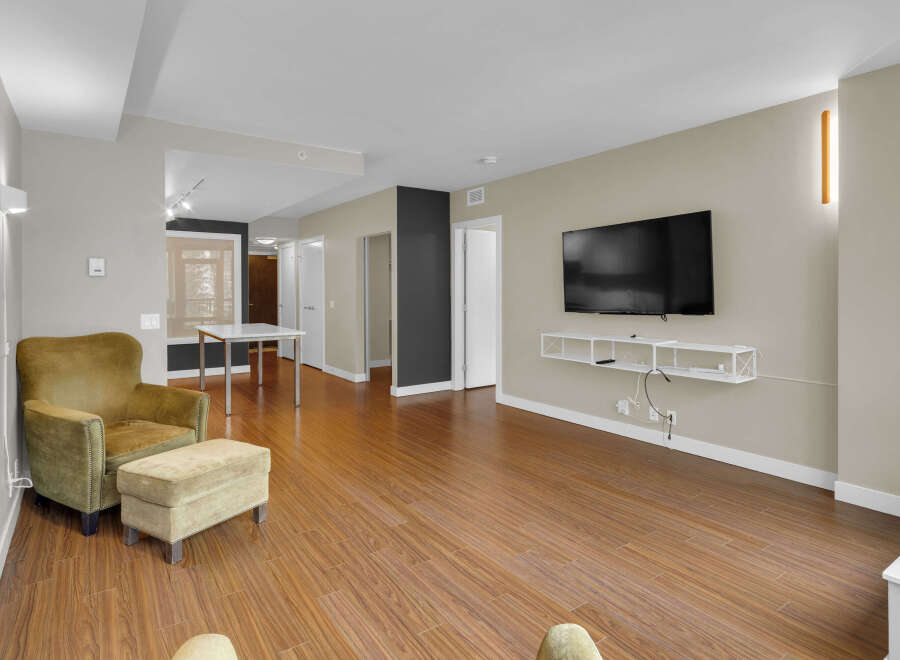Step into modern living with this stunning property featuring a spacious open floor plan and beautiful hardwood floors.