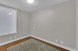 This cozy room offers a blank canvas for your design dreams.