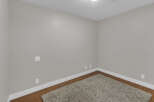 This inviting room showcases a neutral color palette, creating a versatile space ready for personalization.