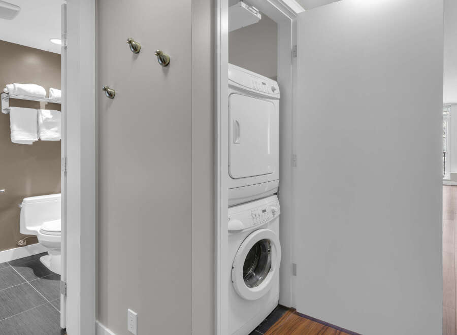 This modern property boasts a convenient in-unit laundry setup, perfect for effortless living.