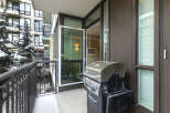 Enjoy outdoor living on this stunning balcony, complete with a grill for effortless entertaining.