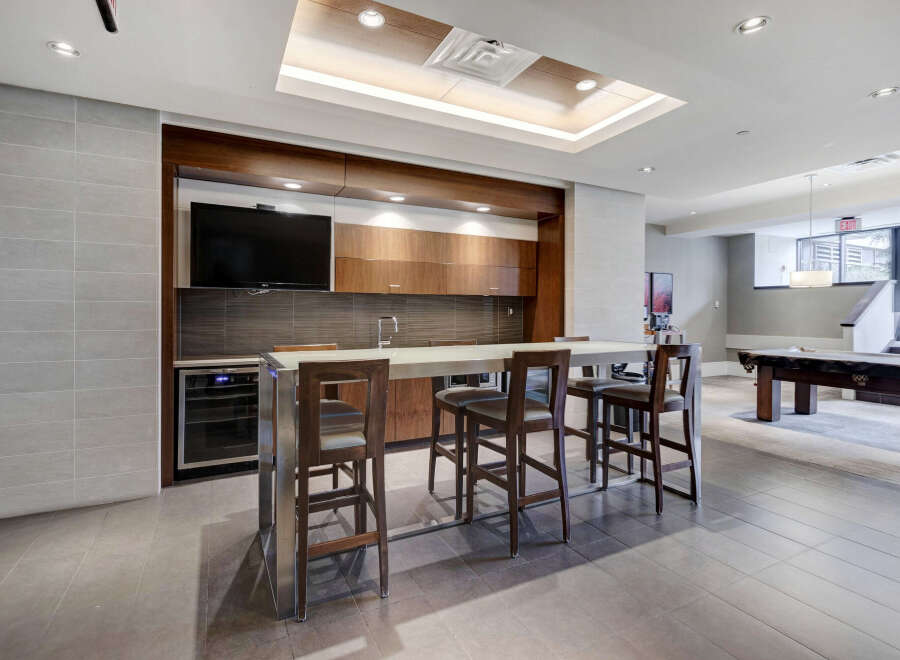 This stunning property boasts a modern entertainment area, perfect for hosting guests.