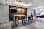 This stunning property boasts a modern entertainment area, perfect for hosting guests.