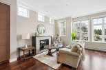 This stunning living room boasts a cozy fireplace, perfect for those chilly evenings.