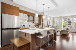 This stunning kitchen boasts modern design with stainless steel appliances and sleek cabinetry.