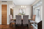 Step into luxury with this stunning dining room! Featuring a modern dining table with plush velvet chairs, this space is perfect for hosting memorable gatherings.