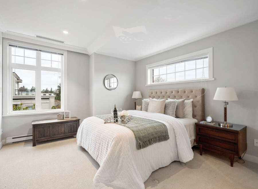 Step into a serene bedroom retreat, designed for ultimate comfort and style.