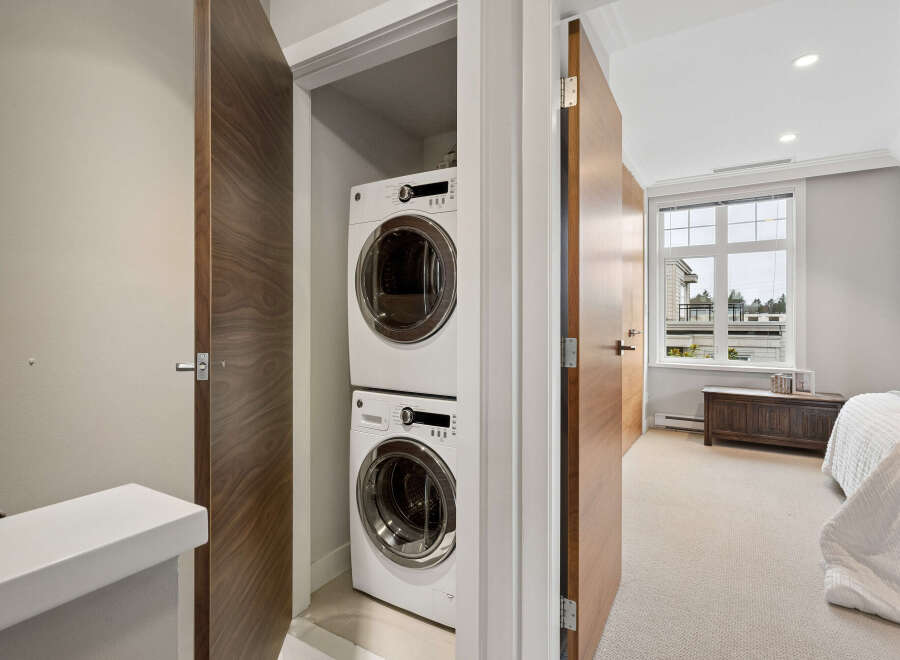 Discover the convenience of in-unit laundry with this stunning property! This home features a modern stacked washer and dryer, making laundry day a breeze.