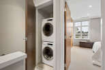 Discover the convenience of in-unit laundry with this stunning property! This home features a modern stacked washer and dryer, making laundry day a breeze.