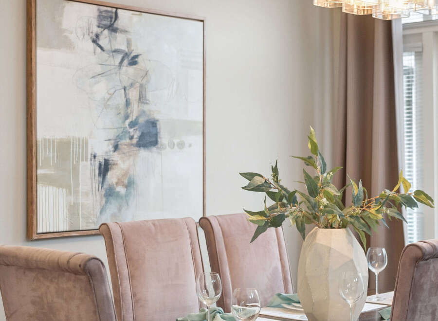 Elegant dining room showcasing a stylish table setting.