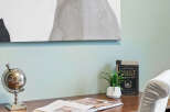 This inviting workspace features a stylish desk, perfect for work or study.